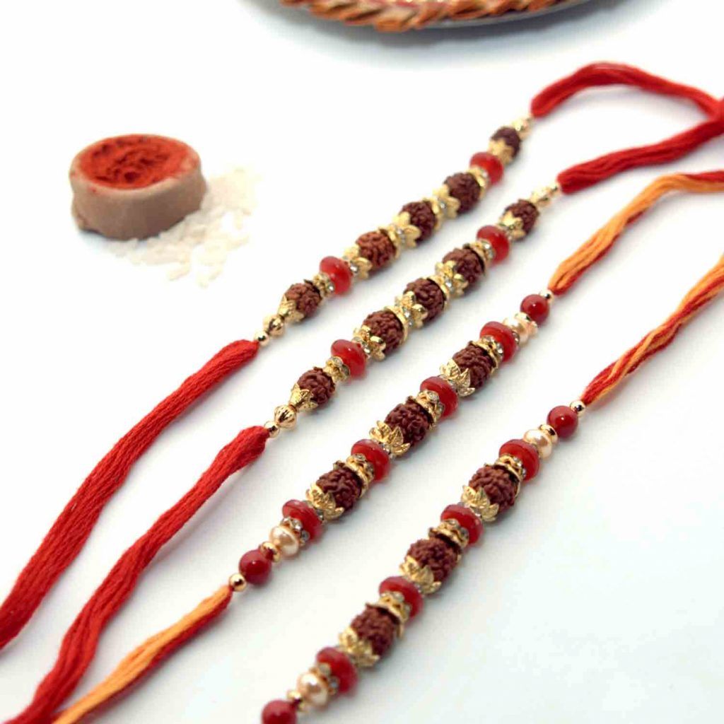 Home / Rakhi Set / Rakhi Set - USA / Rudraksha Seeds Rakhi Set of 4