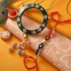 Green Lumba kada with designer Rakhi
