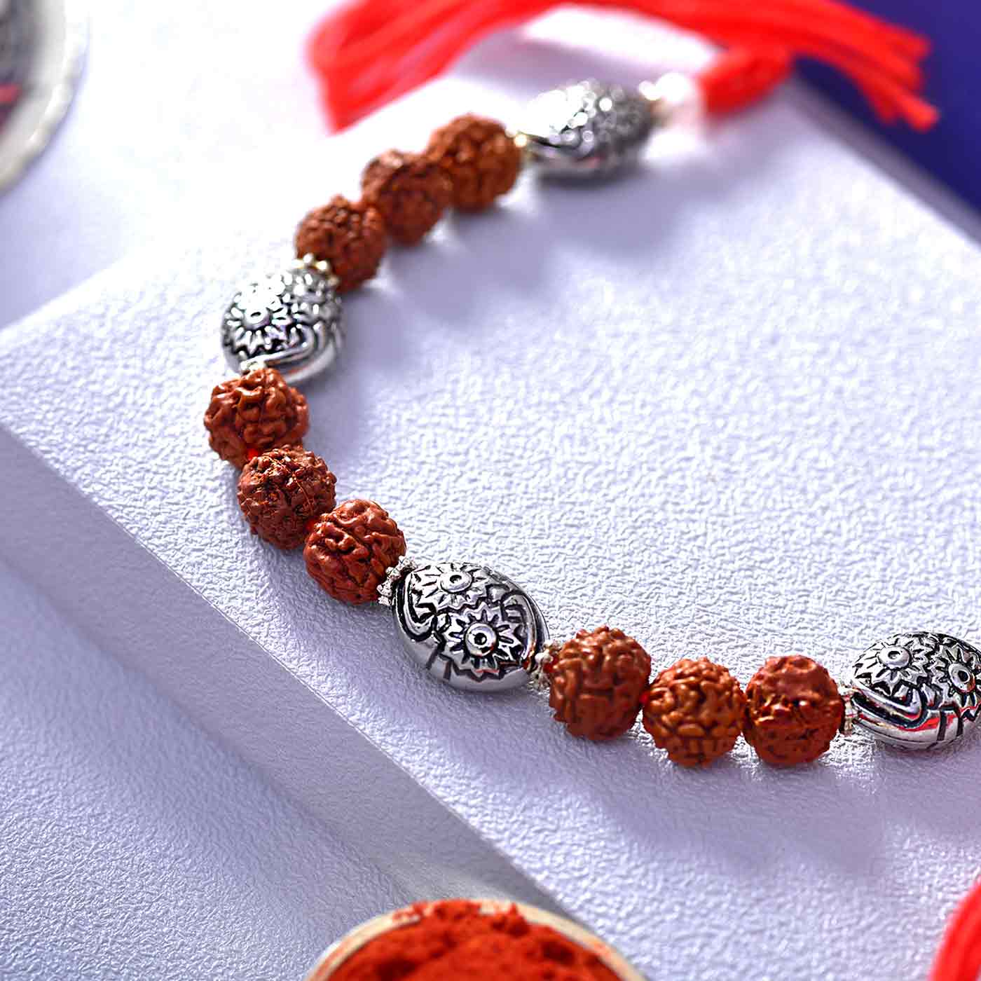 Bracelet Style Silver OM Rakhi | NRI Rakhi