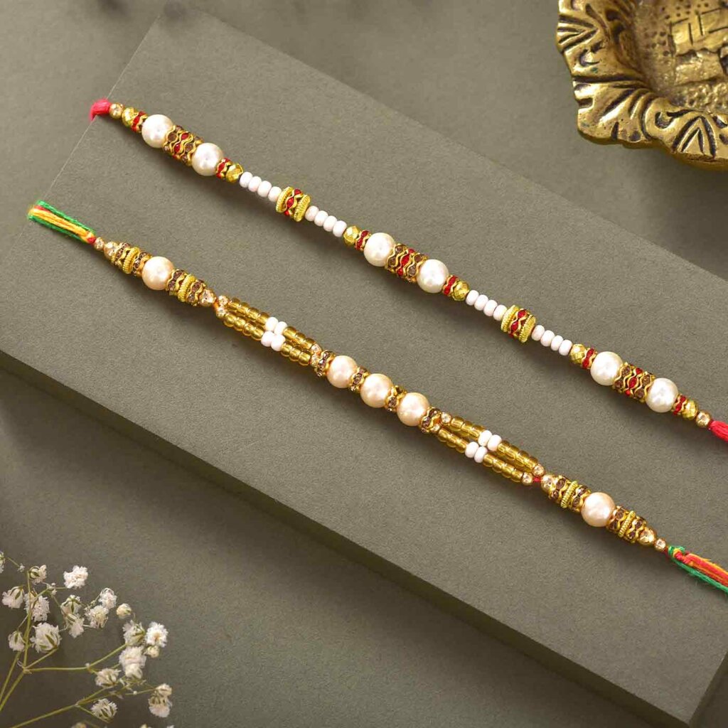 Classy Pearls & Beads Rakhis Set Of 2 with 225 gm kaju 3pc ferrero