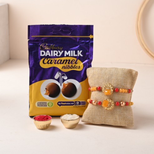 Vibrant Bhaiya Bhabhi Rakhi Set With Cadbury Nibbles