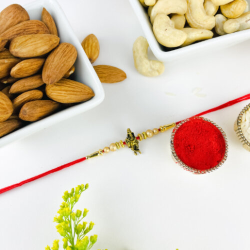 Traditional Krisha Rakhi with Dry Fruits