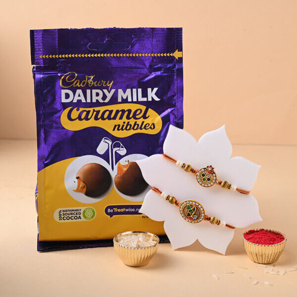 Embellished Rakhi Duo With Cadbury Dark Milk Caramel Bar