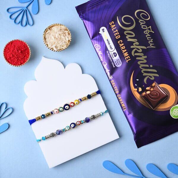 Evil Eye Rakhi Duo With Cadbury Dark Milk Caramel Bar