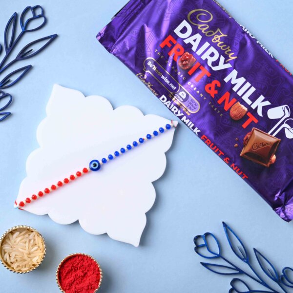 Unique Evil Eye Rakhi With Cadbury Fruit & Nut Chocolate